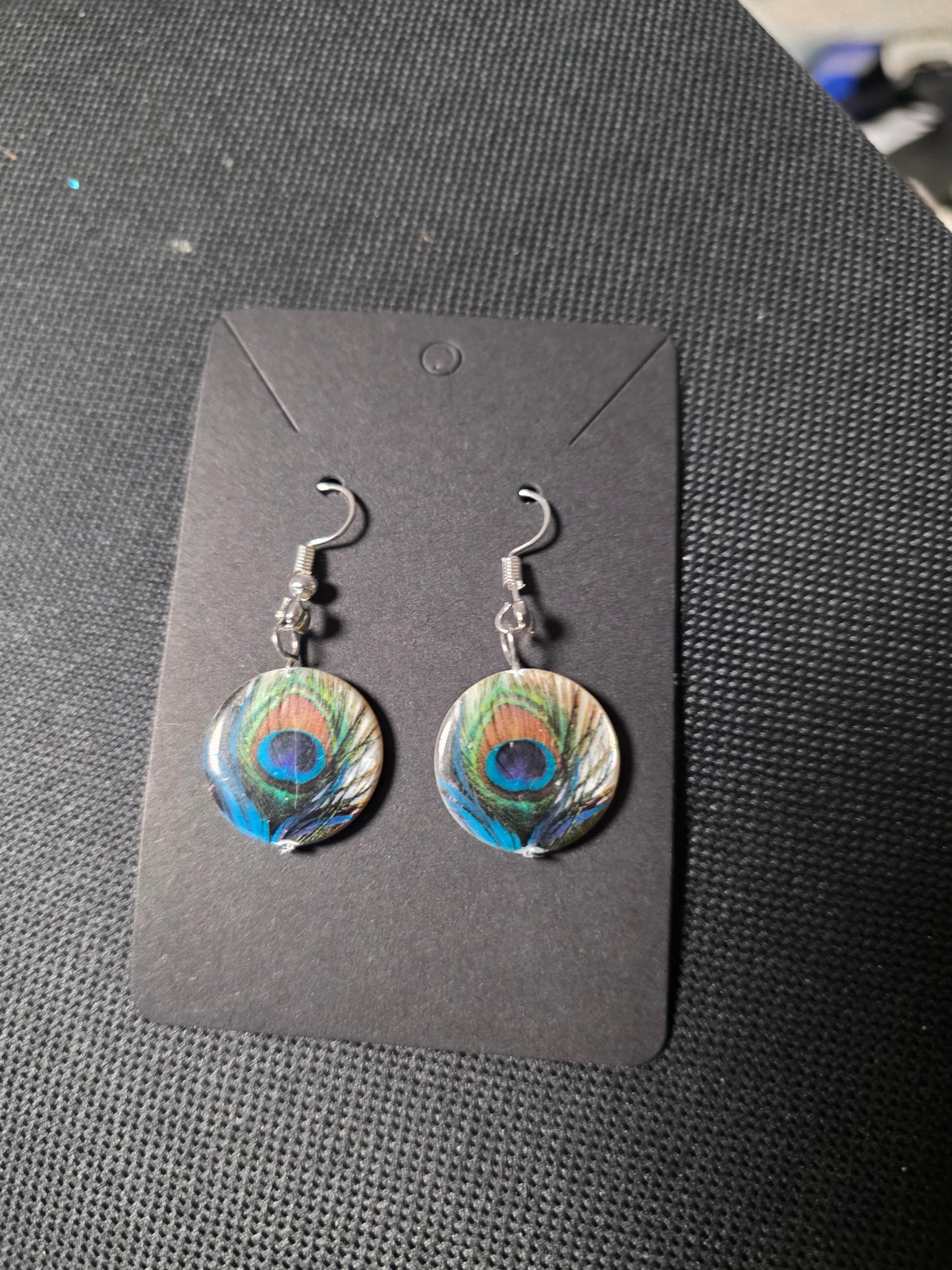 Peacock feather hanging earrings