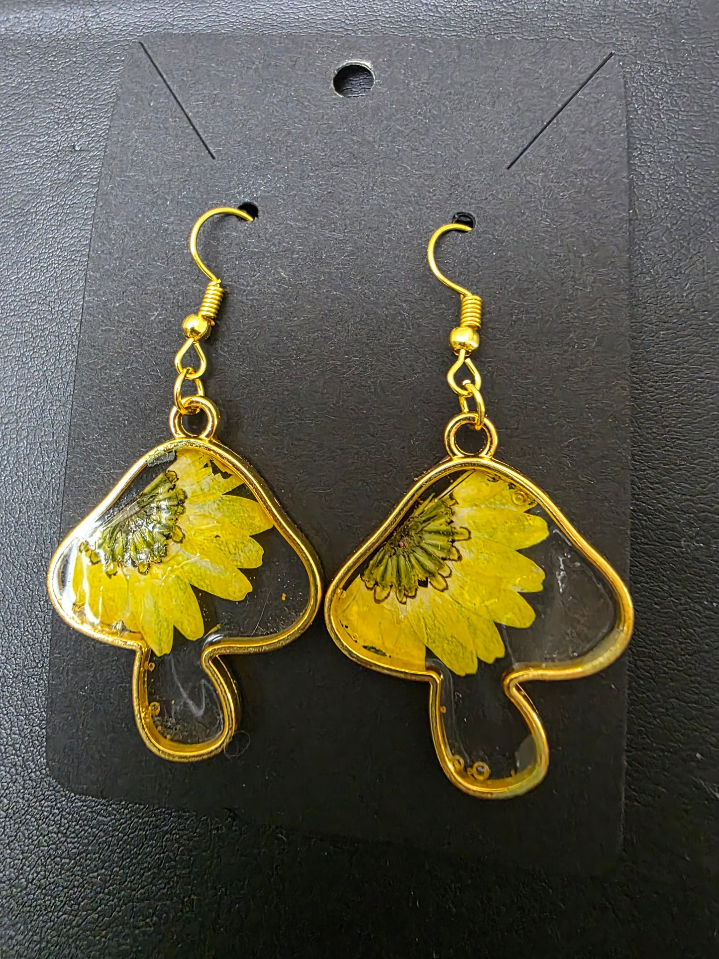 Handmade Mushroom Earrings with dried flowers.